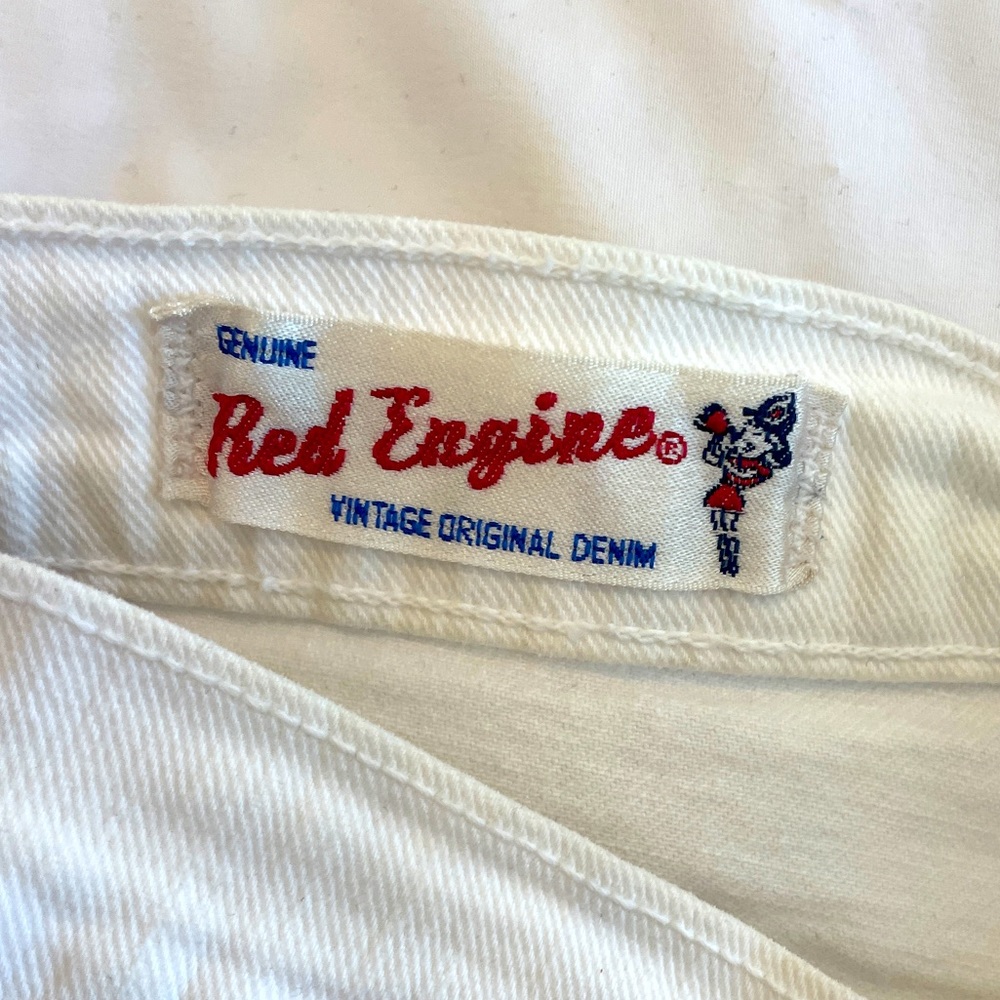 White Red Engine jeans with frayed bottoms